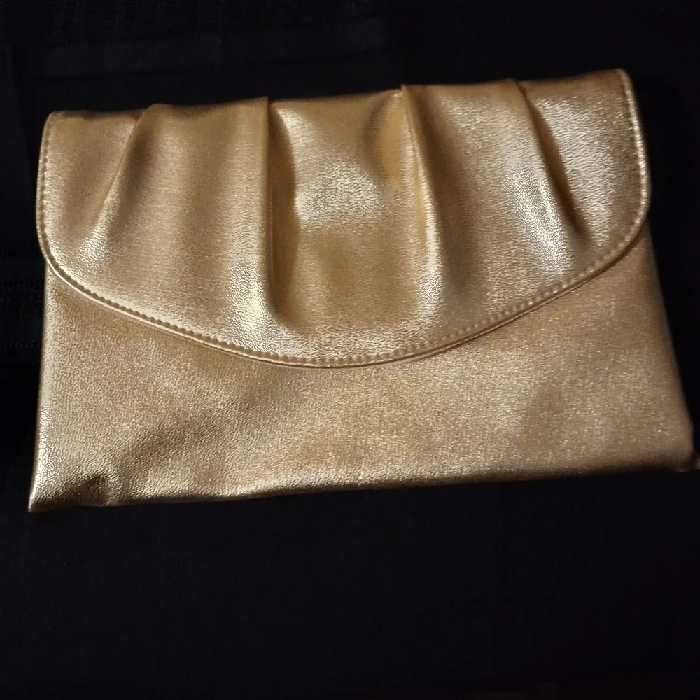 Gold clutch evening bag